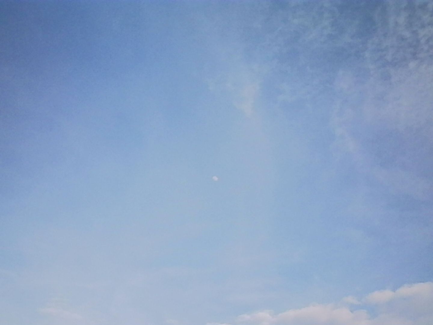 Photo showing a blue sky and clouds, taken using the Kodak Charmera.